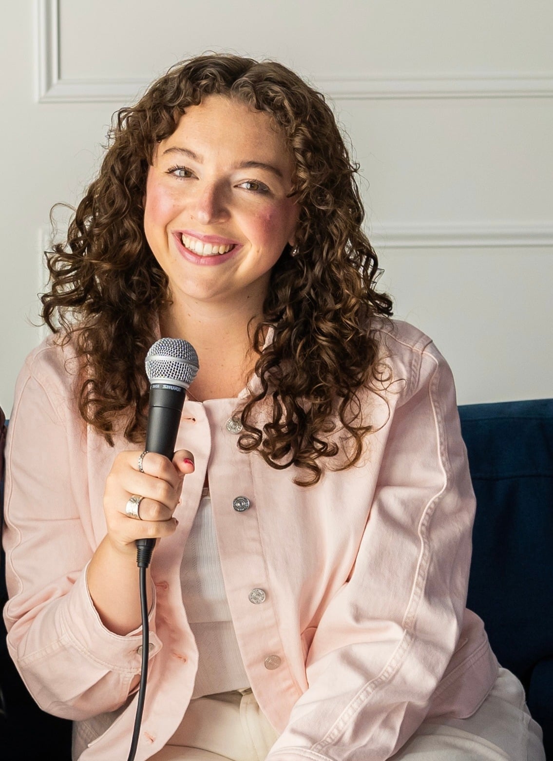 Carissa Lyman holding a microphone